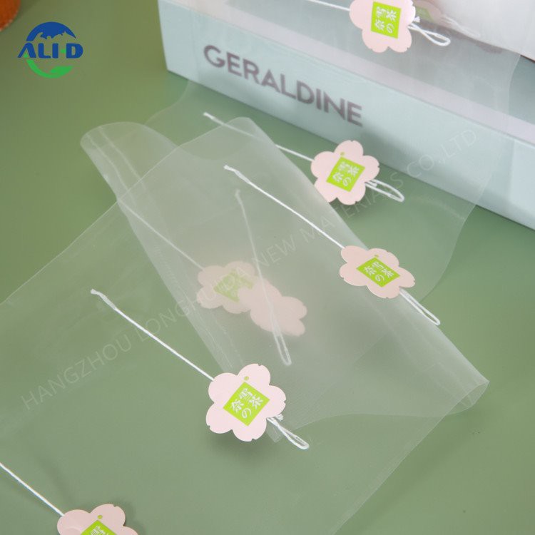 Filem Uncang Teh Piramid Boleh Diperbaharui Dengan Label dan Tali